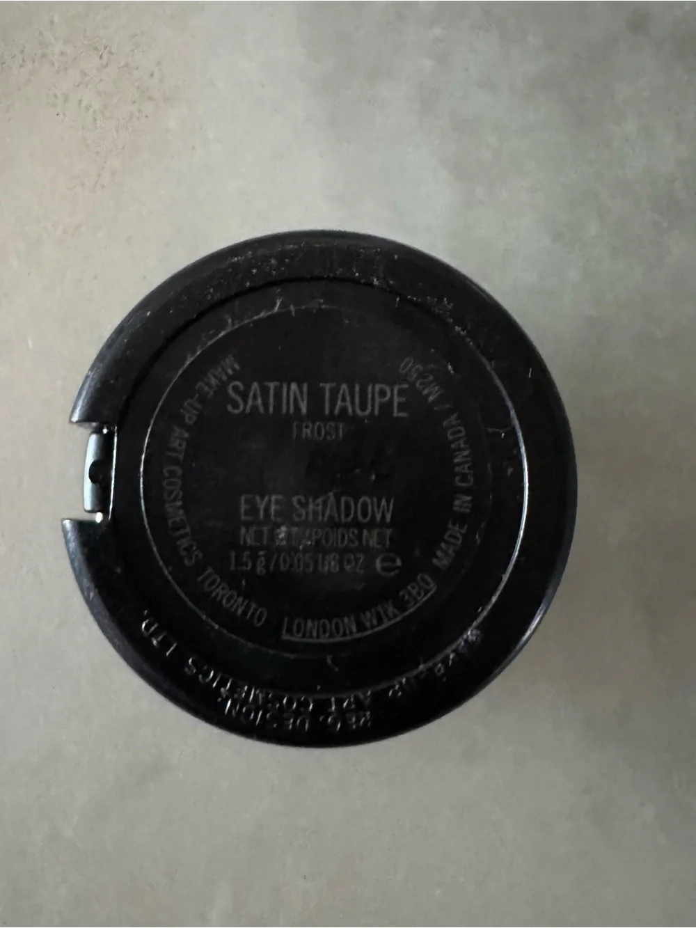 MAC Cosmetics eye shadow in the shade SATIN TAUPE